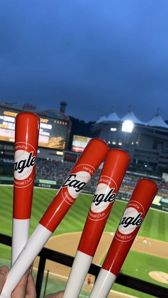 A glowing Hanwha Eagles cheering stick captured after the team’s exciting win, symbolizing the joy of victory.