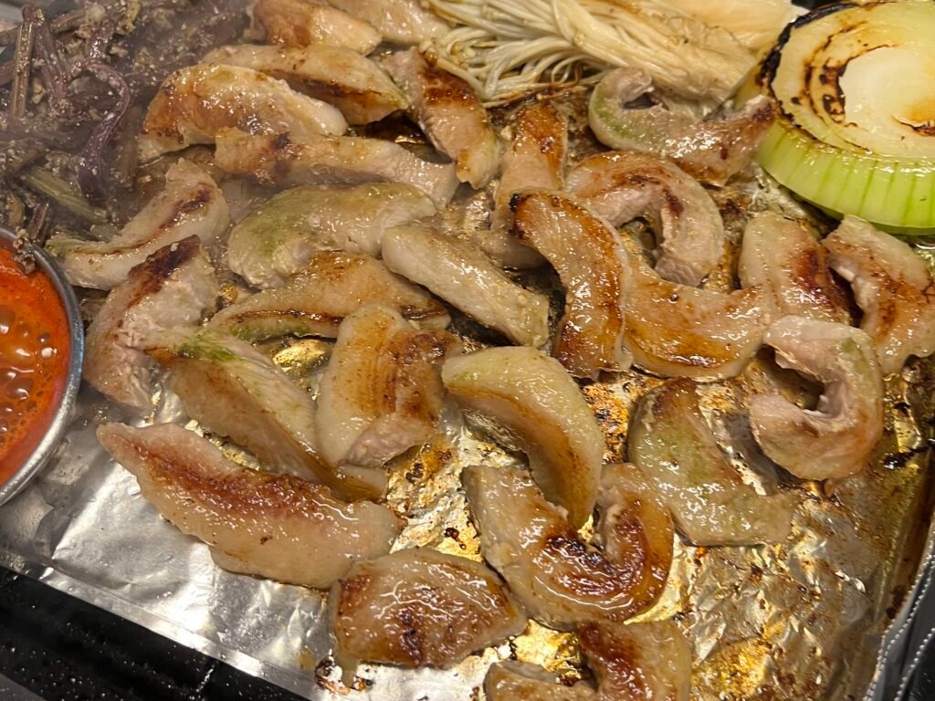 Golden-brown Hwangji-sal, grilled to perfection and cut into bite-sized pieces.
