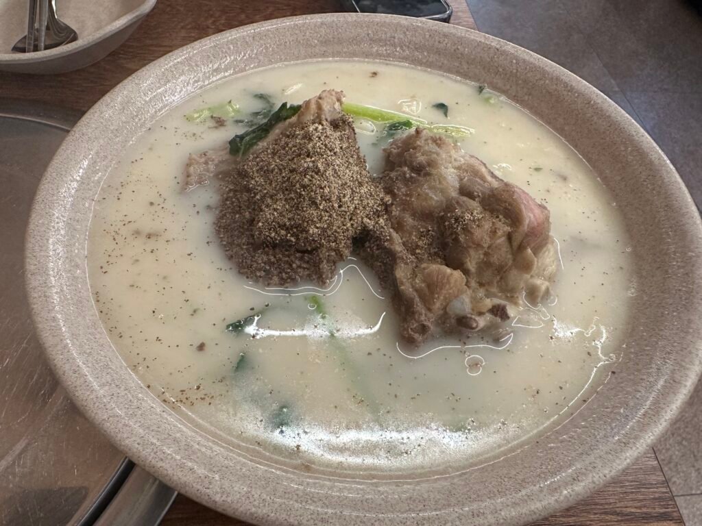 Bbyeokalguksu with a milky white pork bone broth.